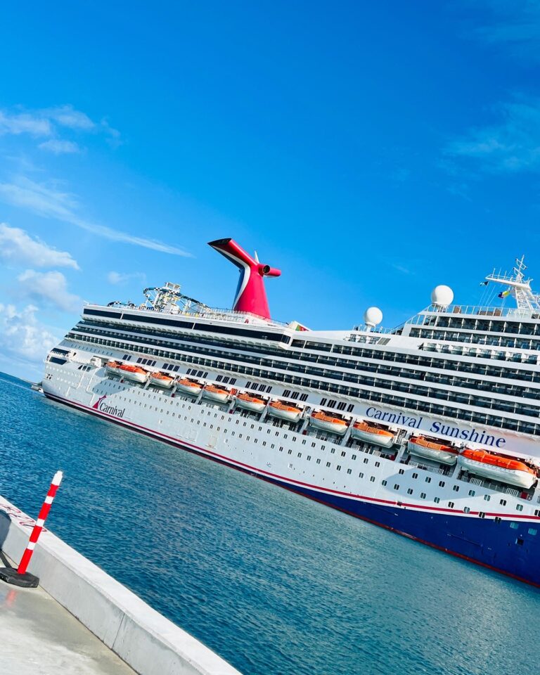 The Carnival Sushine cruise ship docked at a cruise port