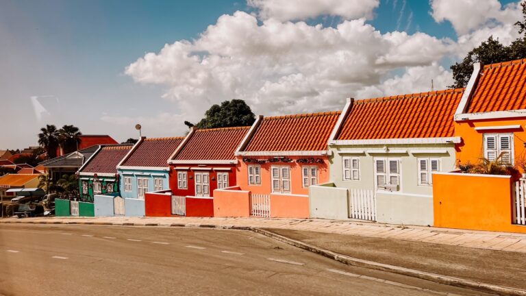 Colorful houses line a street in Curacao